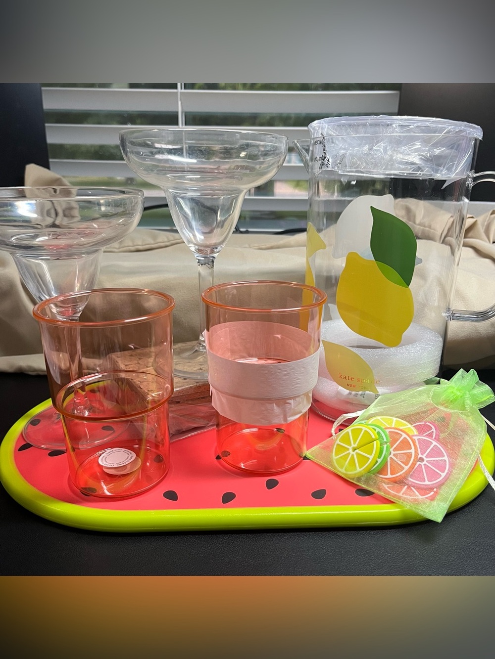 kate spade Clear Lemon Pitcher with Pink Tinted Tumblers plus accessories.